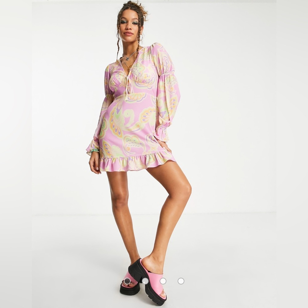 ASOS DESIGN elasticated sleeve tie neck mini dress in large pink floral print
